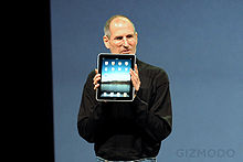 Apple iPad from 2010 being held by Steve Jobs.